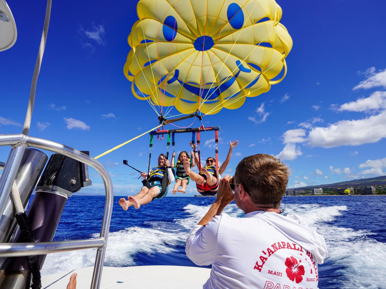 Crew photographing a triple flight from the deck
